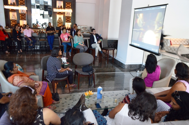 Audience Watching John Luzzini's video wherein he got inspired to create Darjeeling Express flavoured Ecalir